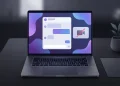Laptop showing an AI chat platform interface with a camera permission indicator