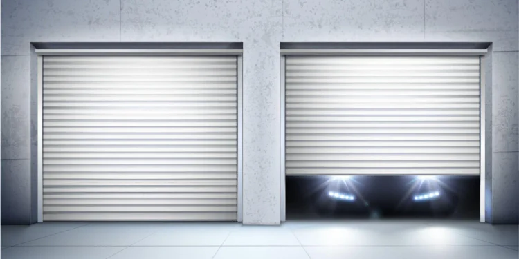 Two metal roll-up garage doors in a concrete wall; the left is closed, while the right is partly open with bright headlights glowing beneath, creating a sleek, dramatic mood.